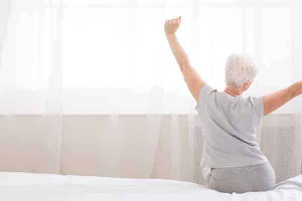 older adult waking up