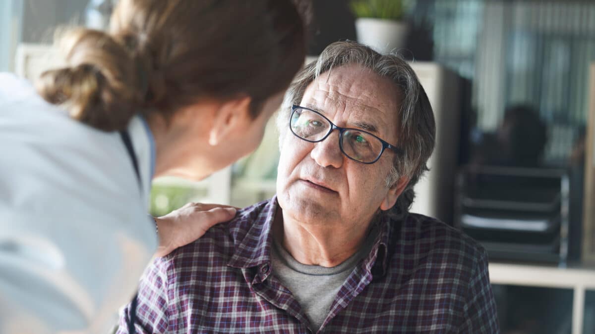 Doctor speaking with older patient