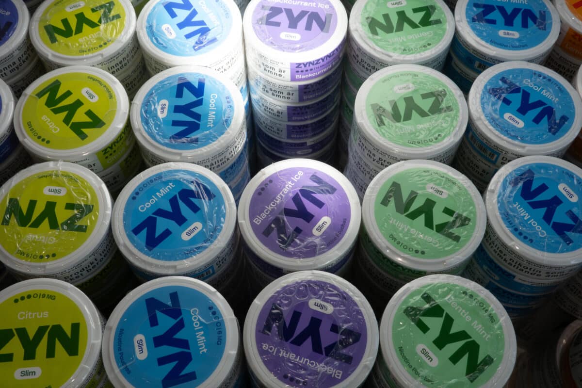 Stockholm, Sweden Aug 24, 2026  Tins of Zyn nicotine pouches in a retail store.
